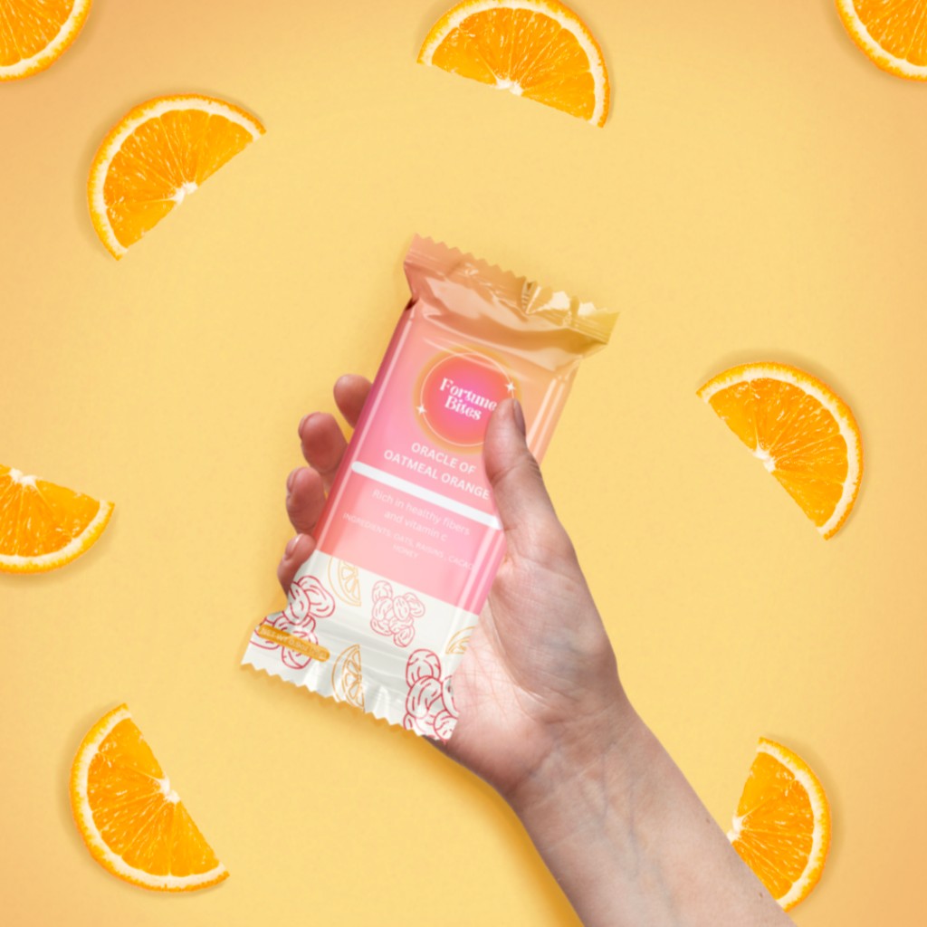 Fortune Bites: brand & product deck page 7: Lifestyle frame: Oracle of Oatmeal Orange sized for the on-the-go.